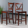 Sgabello da bar Victor V-Back ad altezza bancone, 60 cm, set da 2, in legno/noce